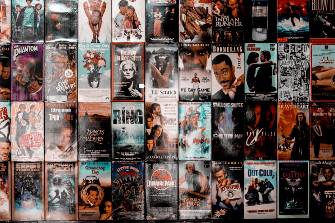 Movie cover wall section at PLAY Arcade